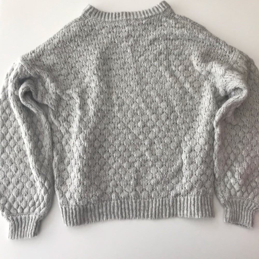 A new day white sweater
